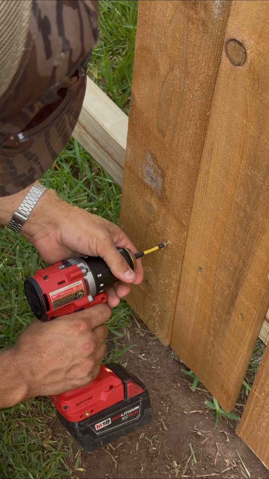 Fence board repair in progress