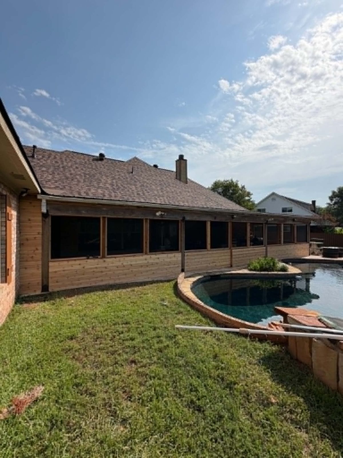 Cedar screened porch with pool view — Shreveport Bossier City LA