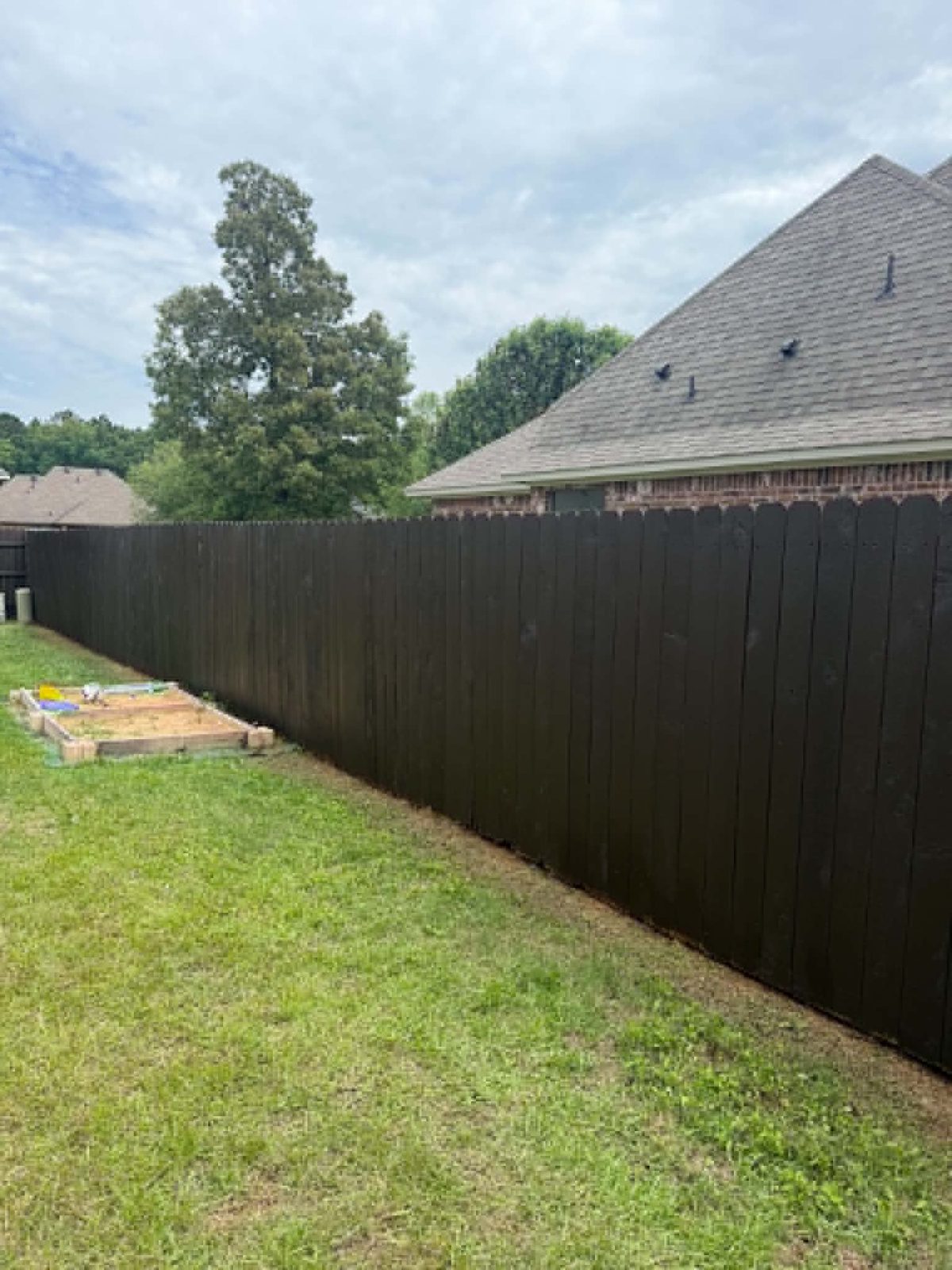 Dark stain on wood privacy fence — Shreveport Bossier City LA