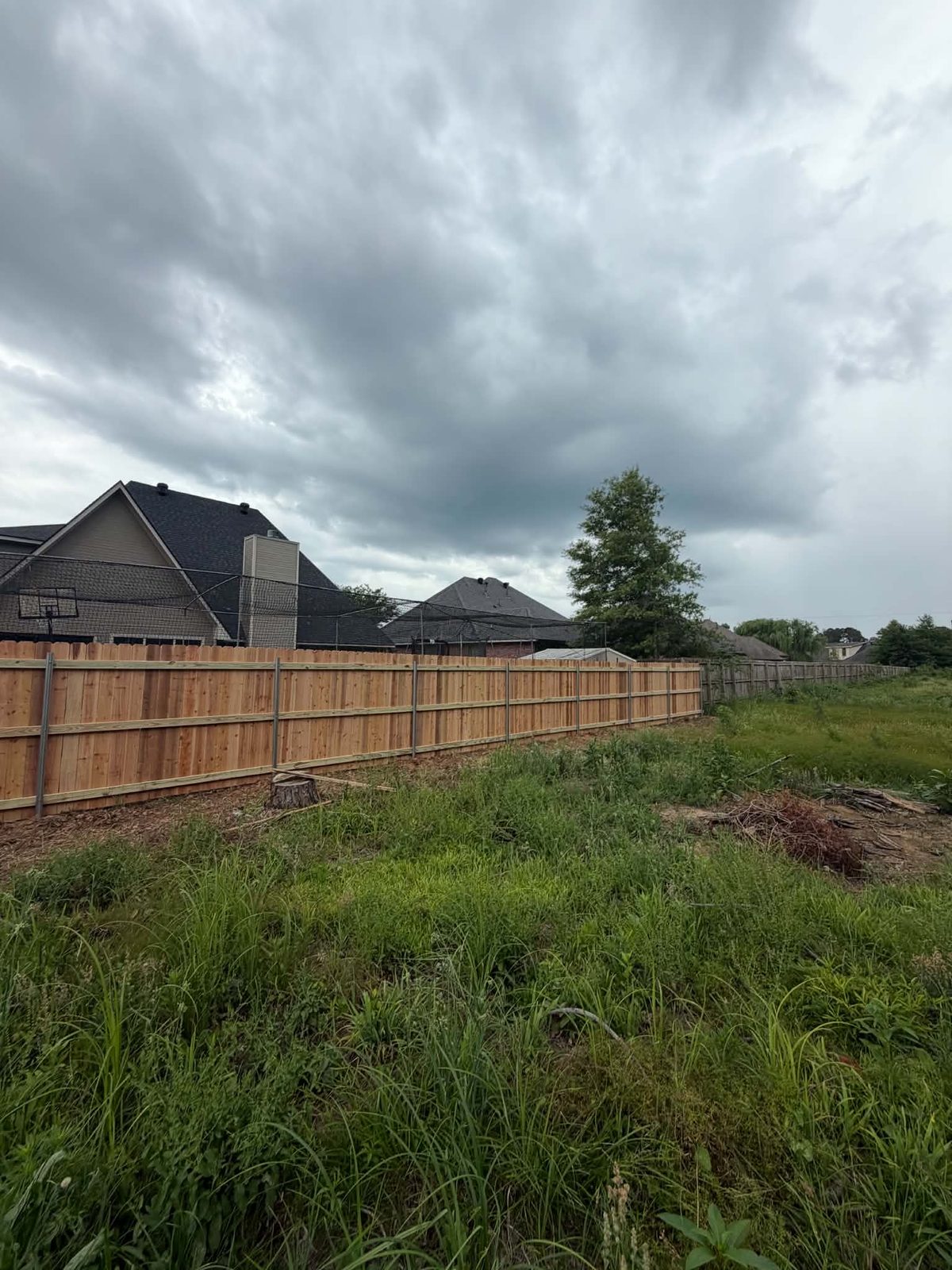 New wood privacy fence installation — Shreveport Bossier City LA