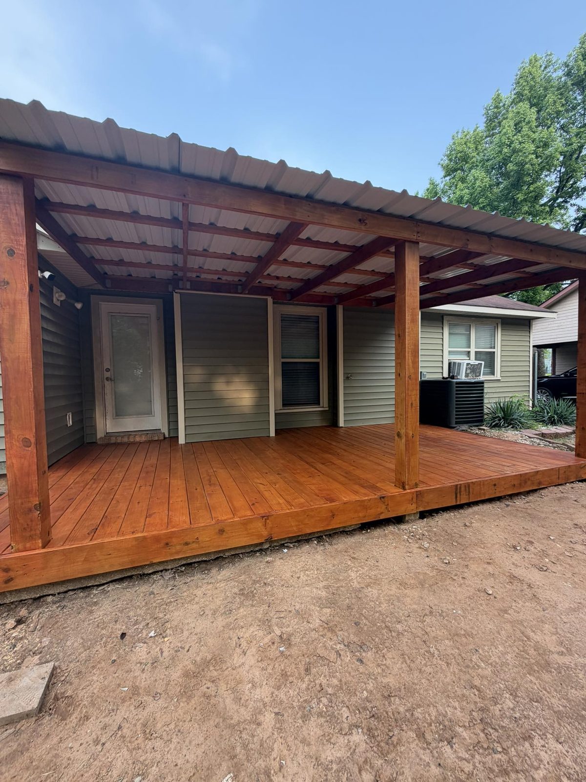 Stained wood deck with covered porch — Shreveport Bossier City LA